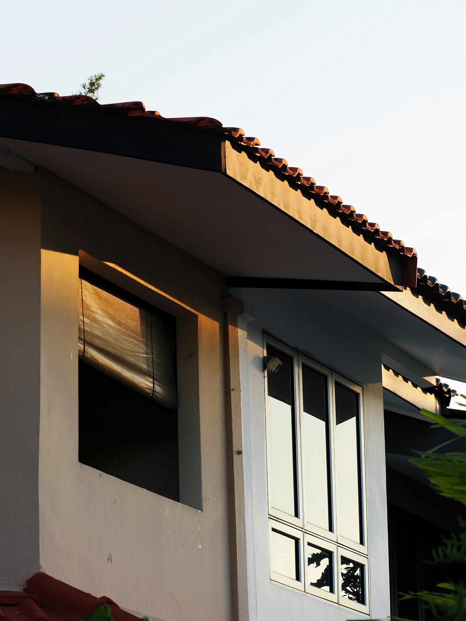 Contemporary residence with strong architectural rooflines
